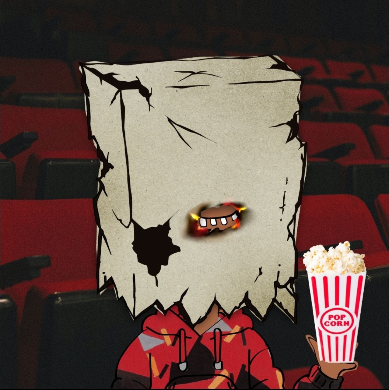 Bag head in a hoodie alone in a movie theater holding a striped tub of popcorn